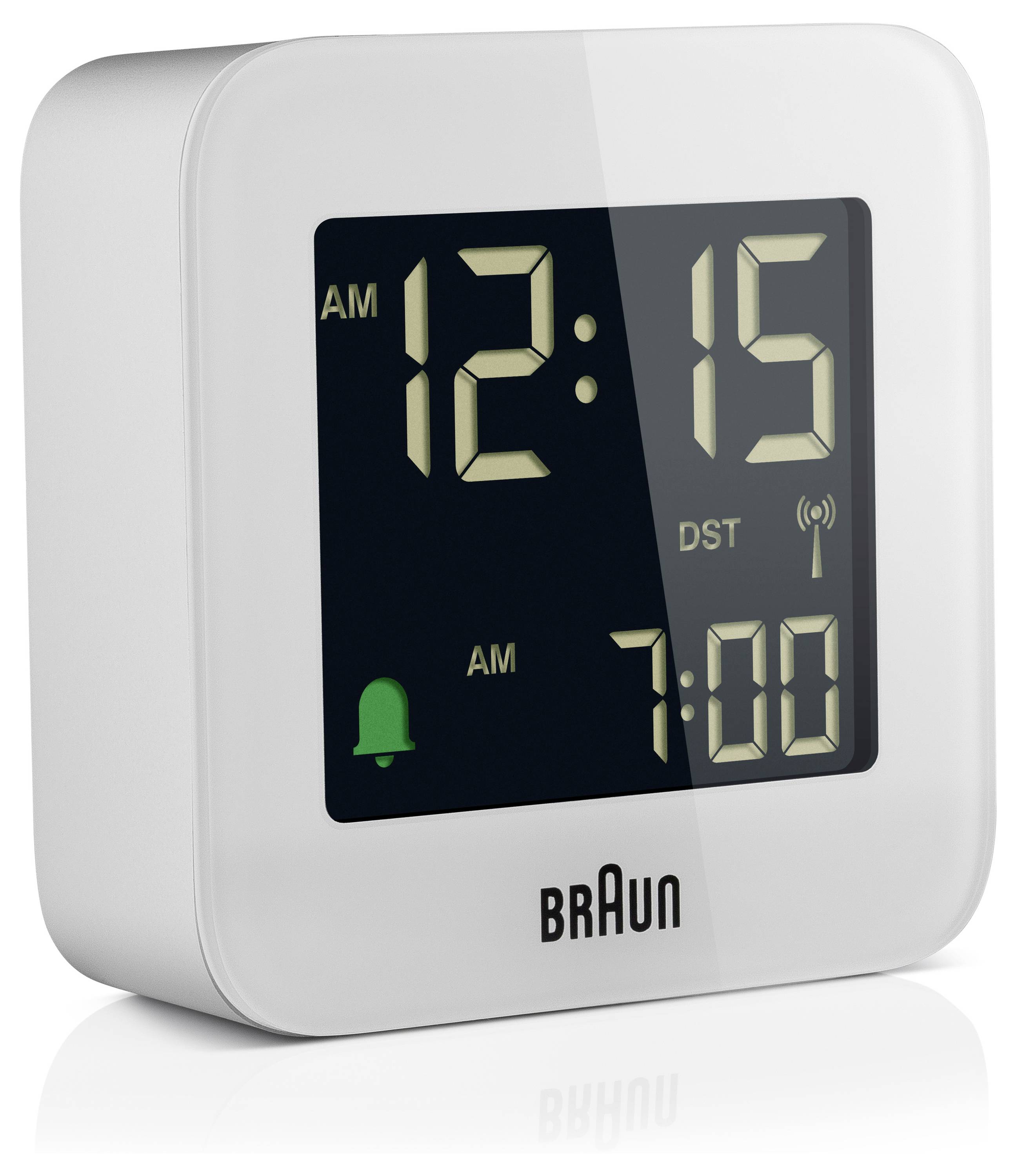 Réveil numérique Braun blanc affichant 12h15 du matin, avec alarme réglée sur 7h00 et indicateur d'heure d'été activé à l'écran.