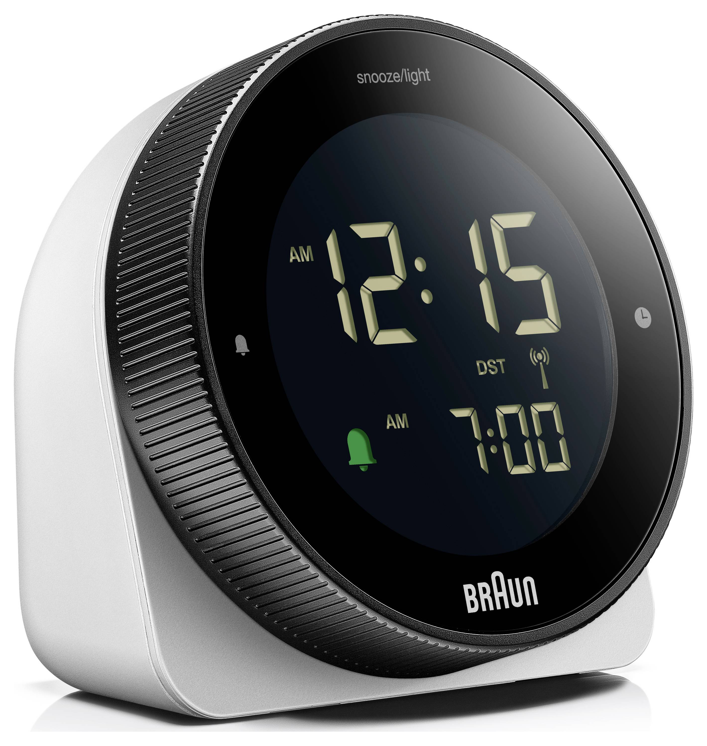Réveil numérique Braun avec affichage circulaire indiquant 12:15 AM et alarme réglée pour 7:00 AM.