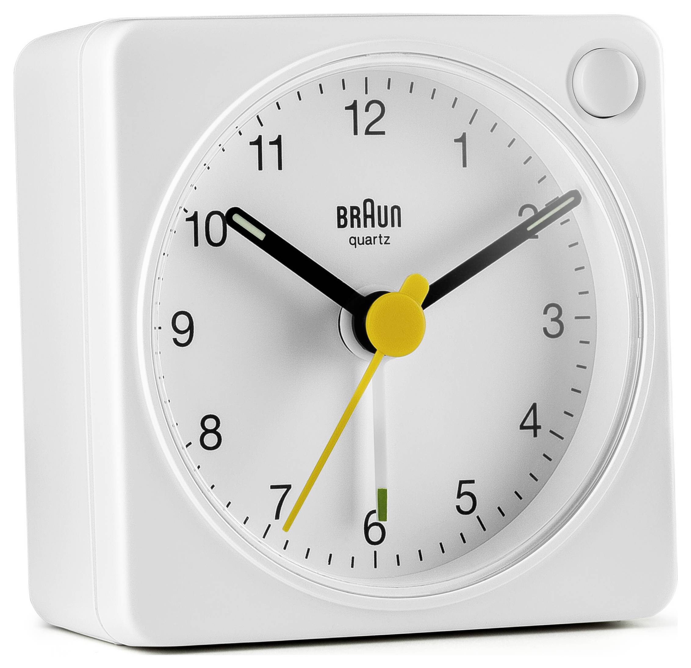 Horloge de table Braun blanche avec alarme à quartz affichant environ 10:10, avec une trotteuse jaune, dans un boîtier carré.
