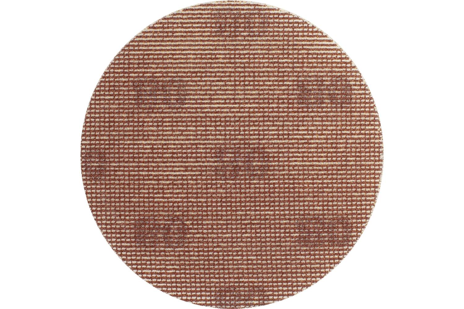 A circular close-up of a red-brown woven or textured fabric pattern filling the frame.