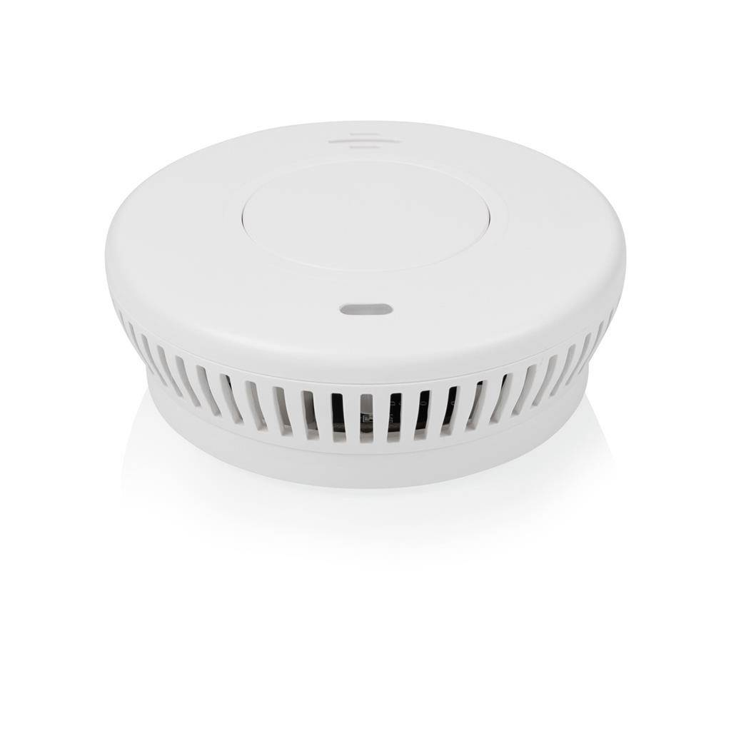 White round smoke detector with vent slots and central test button, shown on a plain white background.