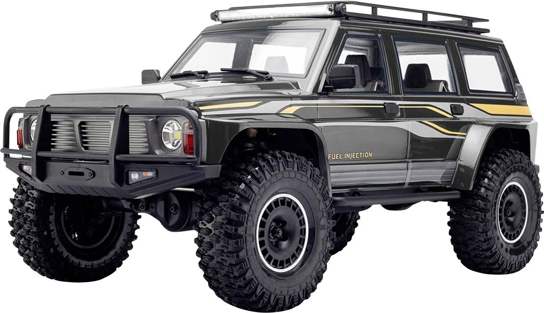 SUV tout-terrain gris avec des pneus surdimensionnés, un porte-bagages sur le toit et une bande latérale jaune, présenté sur un fond blanc.