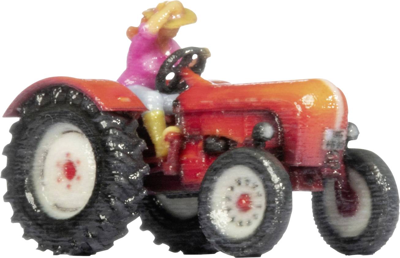 Petit tracteur orange jouet avec des roues noires et une petite figurine de conducteur rose et jaune sur un fond blanc.