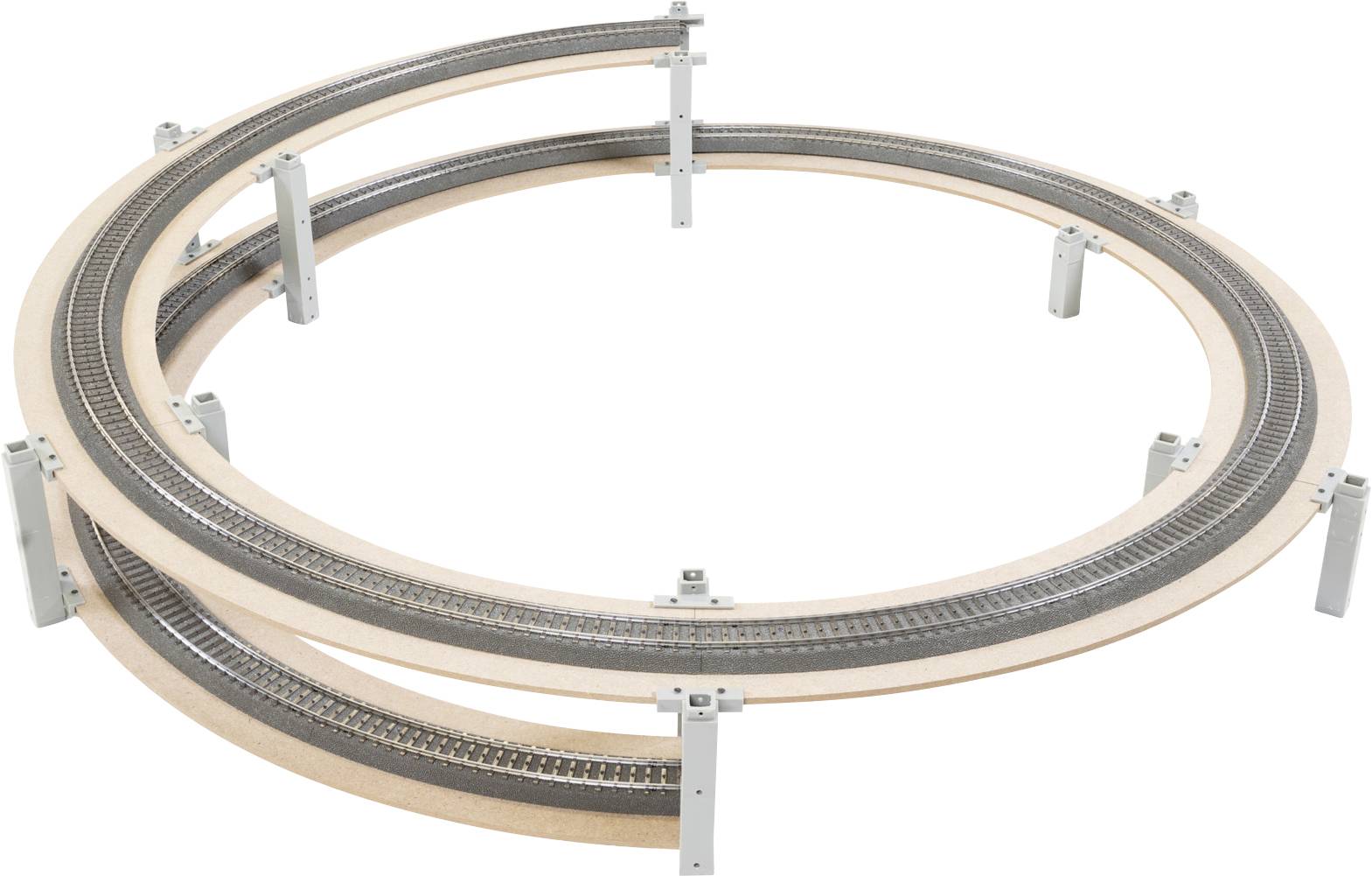 Modèle de train circulaire à deux niveaux avec boucles intérieures et extérieures, soutenu par des supports métalliques sur fond blanc.