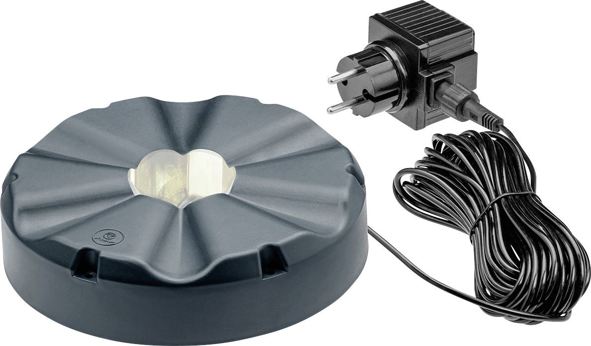 Appareil rond et sombre avec un cordon d'alimentation enroulé et un adaptateur de prise, présenté sur un fond blanc.