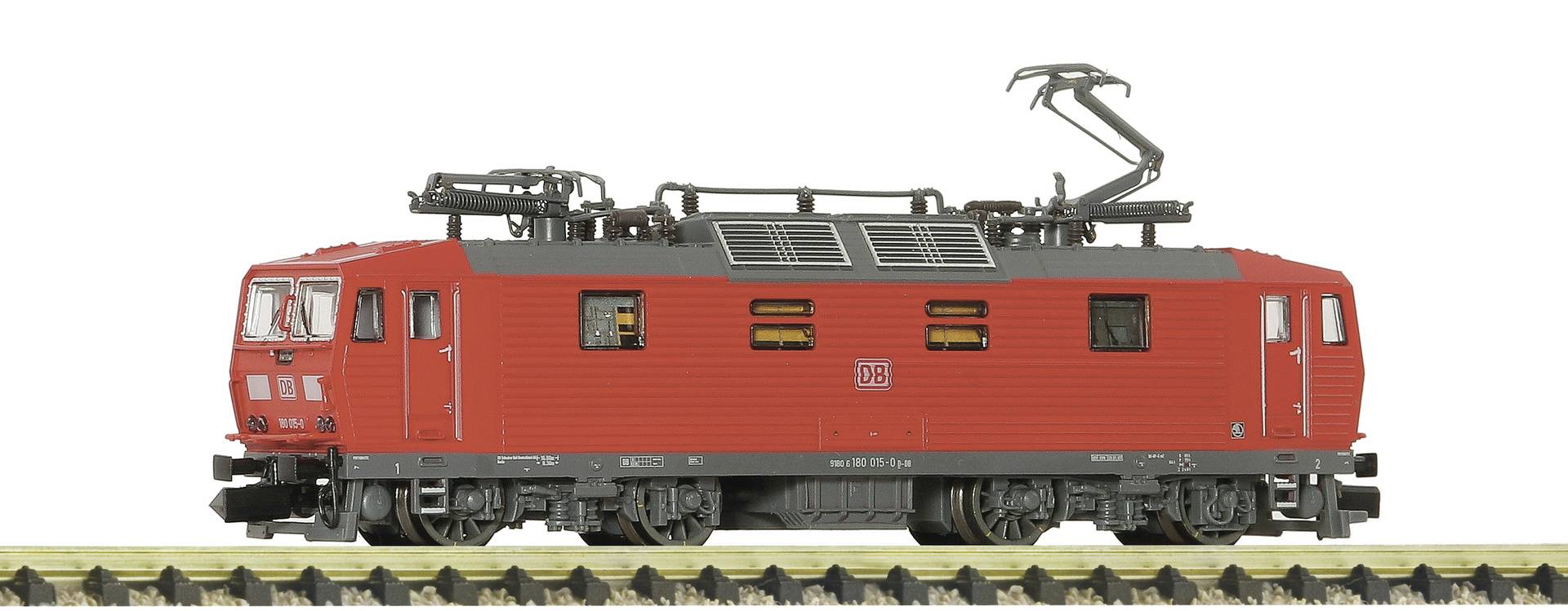 Drei Seitenansicht-Modell-Passagierwagons in Dunkelblau mit grauen Dächern, beschriftet mit „Suisse Train Bleu
