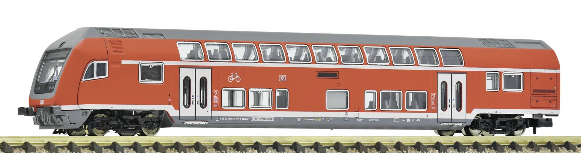 Voitures de passagers de trains miniatures portant l'étiquette « Deutsche Weinstrasse » sur une voie, avec « Photomontage » dans le coin supérieur droit.