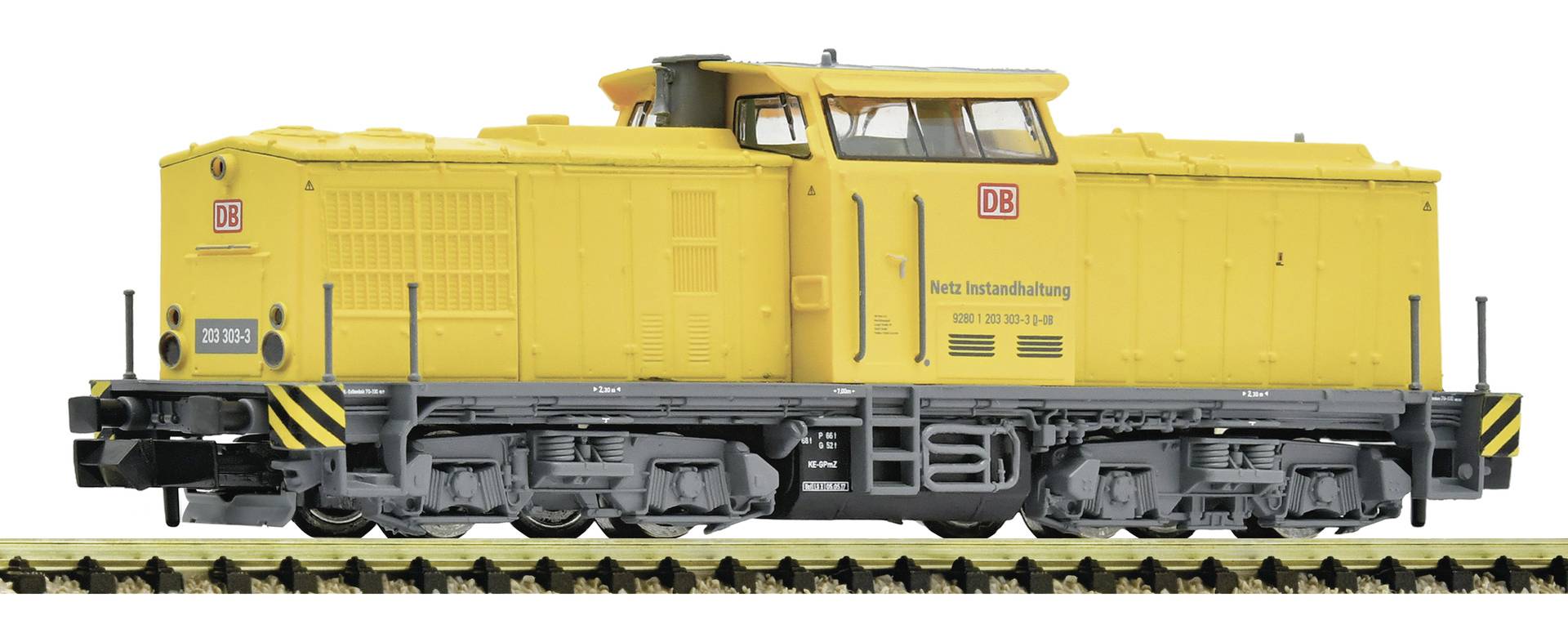 Locomotive diesel Deutsche Bahn jaune montrée en vue latérale sur les voies.