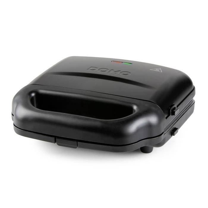 Black sandwich press with a handle and indicator lights on top, shown closed on a white background.