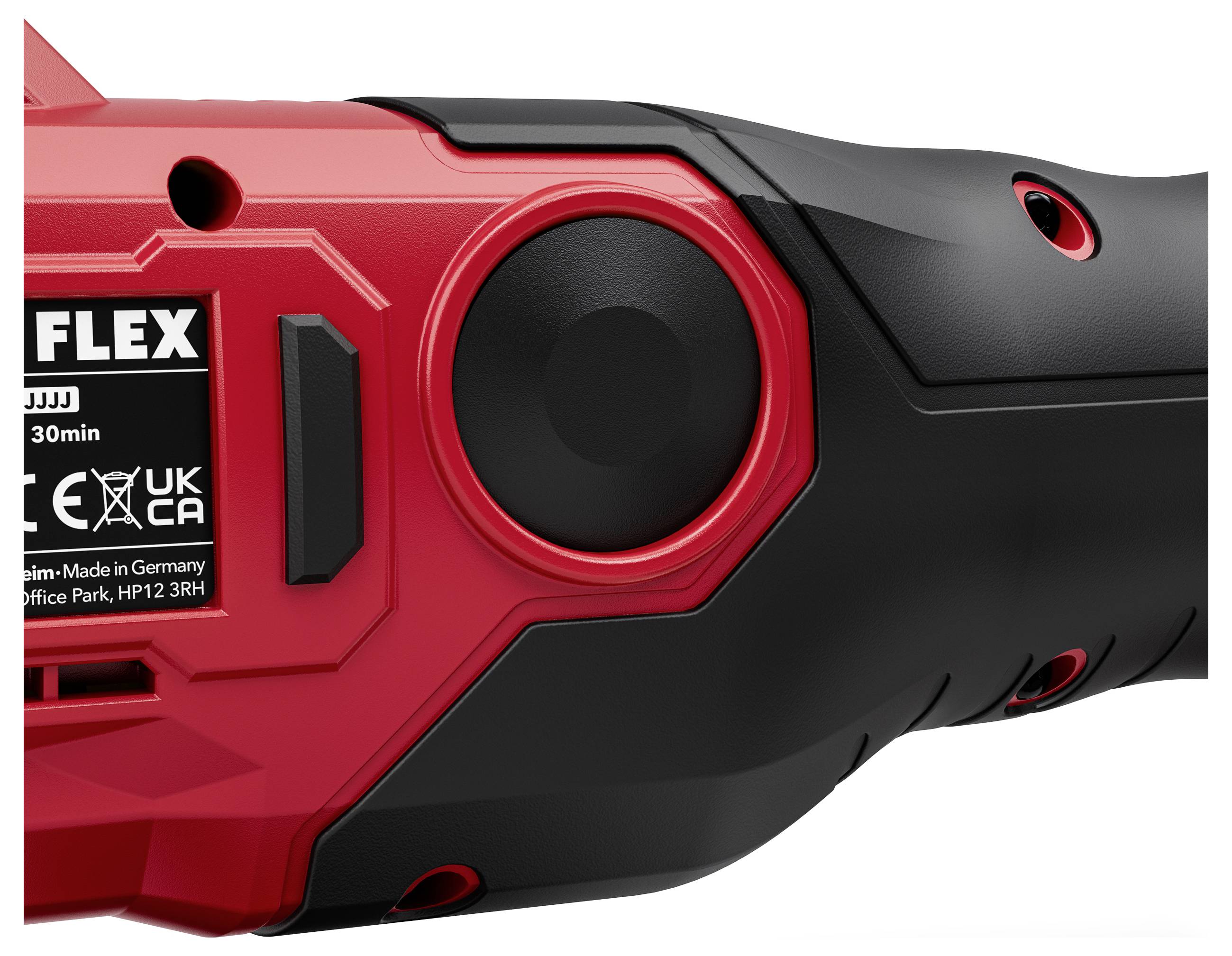 Gros plan du boîtier d'un outil électroportatif FLEX rouge et noir avec un grand bouton circulaire latéral et des détails d'étiquette visibles.