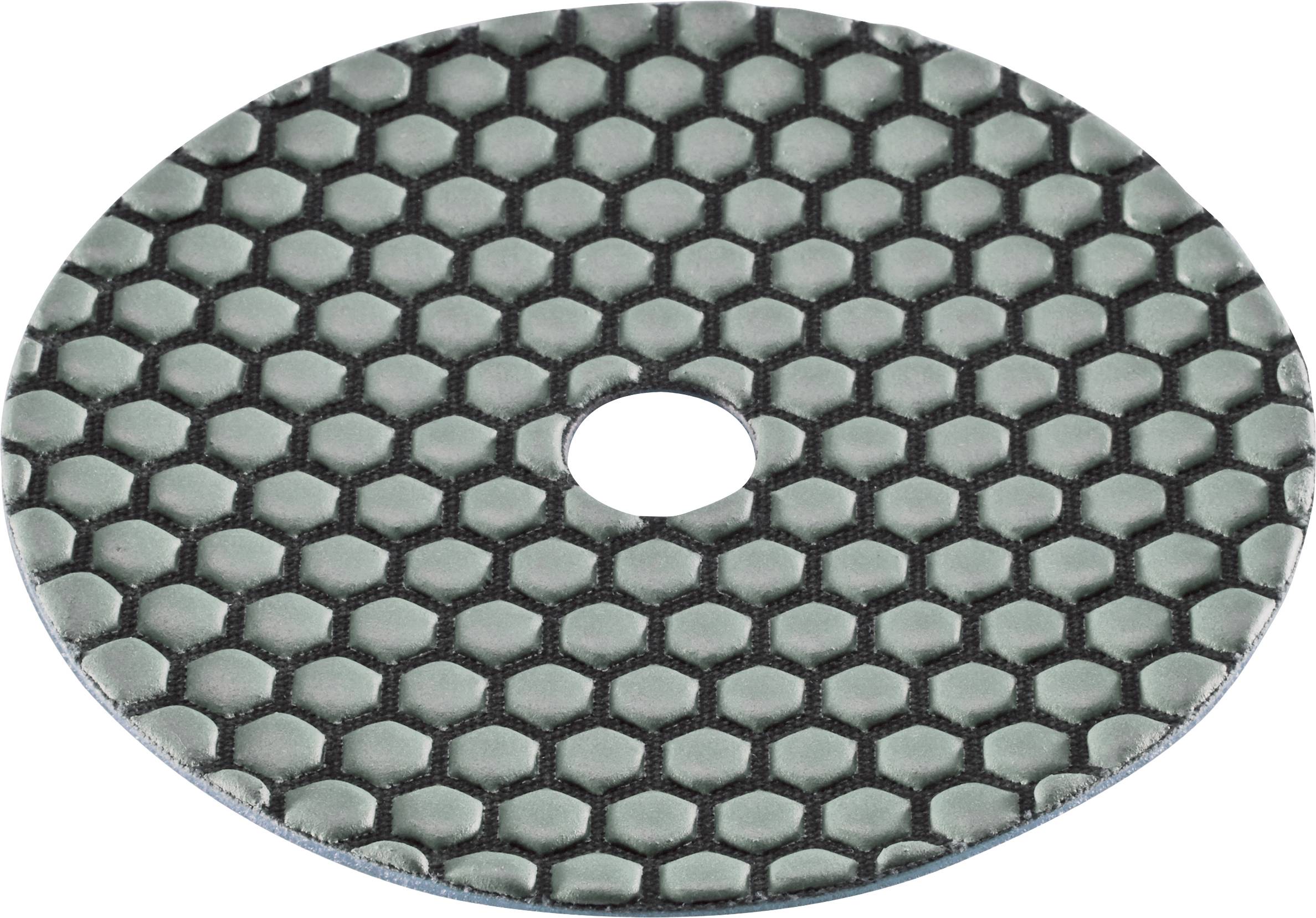 Coussin ovale noir texturé avec un trou central et un motif en nid d'abeille hexagonal