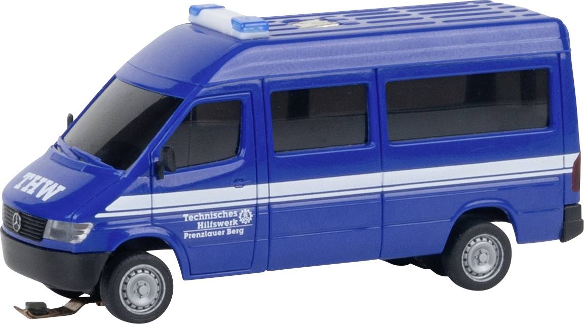 Fourgon de service d'urgence bleu modèle étiqueté THW et Technisches Hilfswerk Prenzlauer Berg, montré en vue latérale sur un fond blanc.