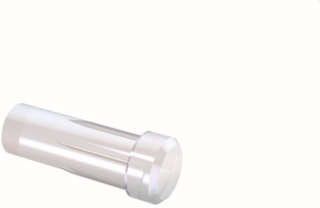 Une capsule ou un récipient cylindrique transparent clair reposant sur son côté contre un fond blanc.
