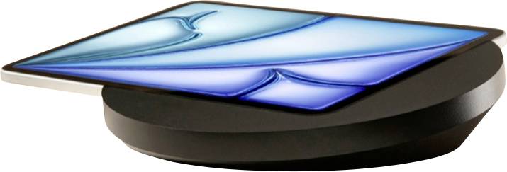Un appareil rond et élégant de couleur noire avec un dessus en verre bleu rectangulaire et plat, présenté en vue latérale.