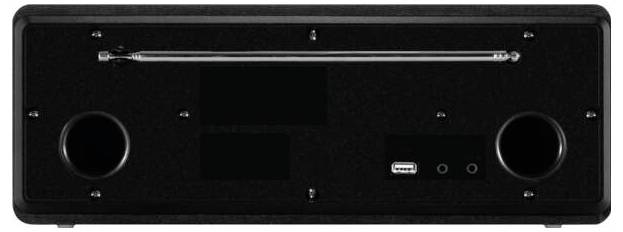 Vue de face d'un haut-parleur noir rectangulaire ou d'une unité médias avec deux grands ports circulaires, une zone d'affichage centrale et une entrée USB et audio sur le panneau avant.