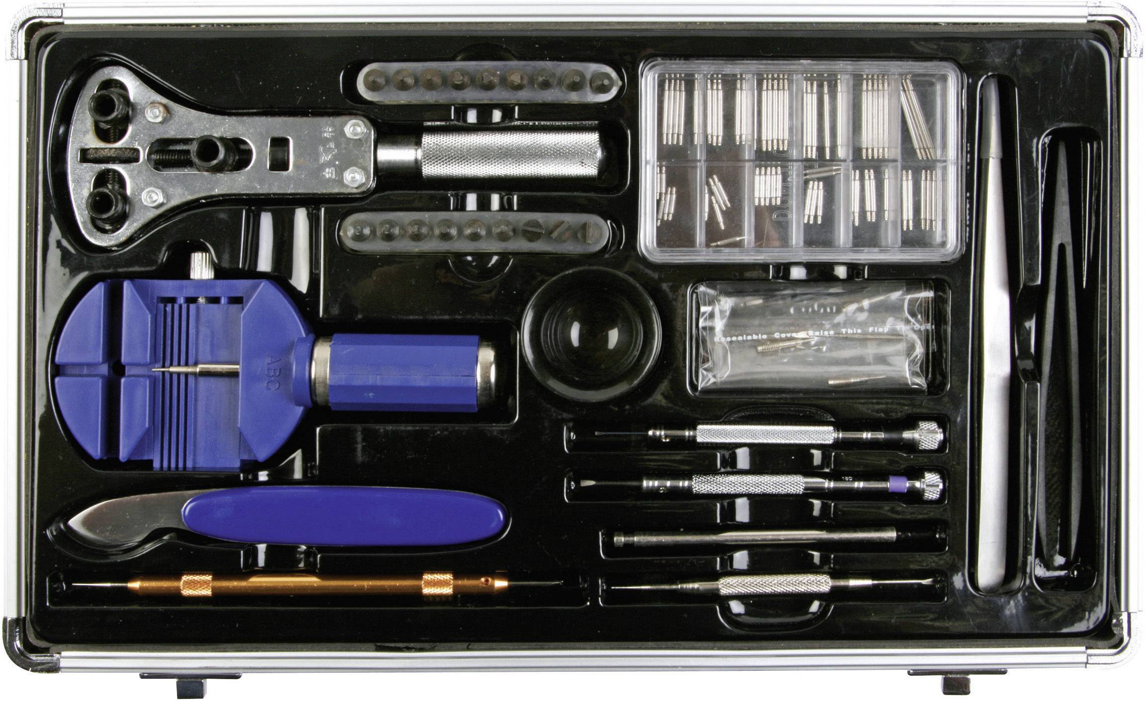 Coffret d'outils d'horloger comprenant différents tournevis, pinces, ouvre-boîtes de montre, support de boîtier et pièces de rechange, dans un étui noir.