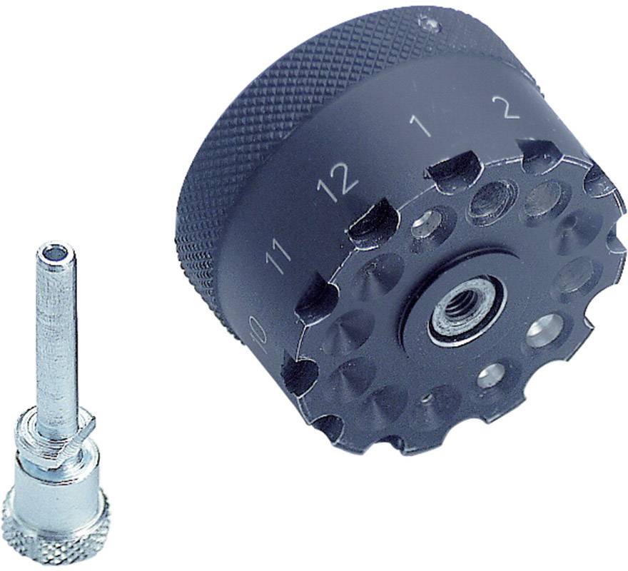 Une molette noire numérotée de 1 à 12 et un adaptateur de valve argenté.