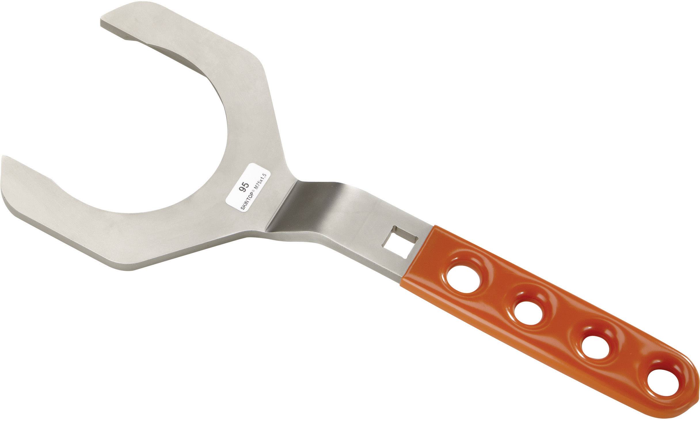 Une clé à molette à poignée orange avec des perforations, adaptée pour serrer ou desserrer de grands écrous ou tuyaux.