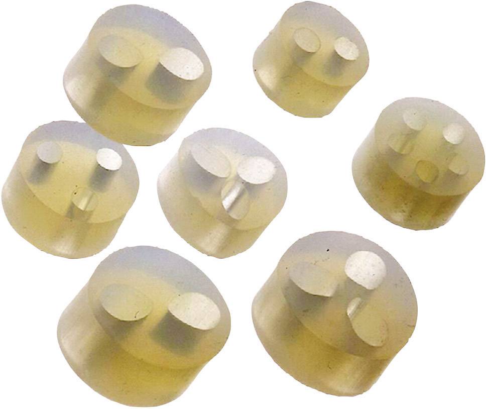 Plusieurs bouchons en silicone de couleur beige clair, de forme ronde, présentant deux, trois ou quatre cavités concaves sur une surface blanche.