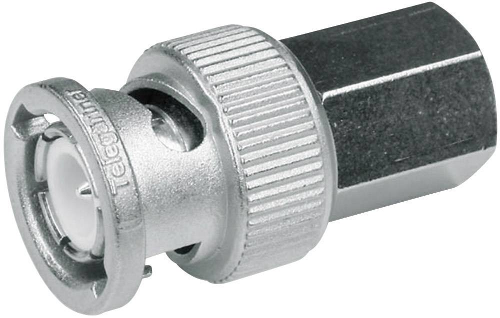 Un adaptateur métallique avec un mécanisme de vissage, adapté aux connexions de câbles coaxiaux, est montré depuis une perspective latérale.