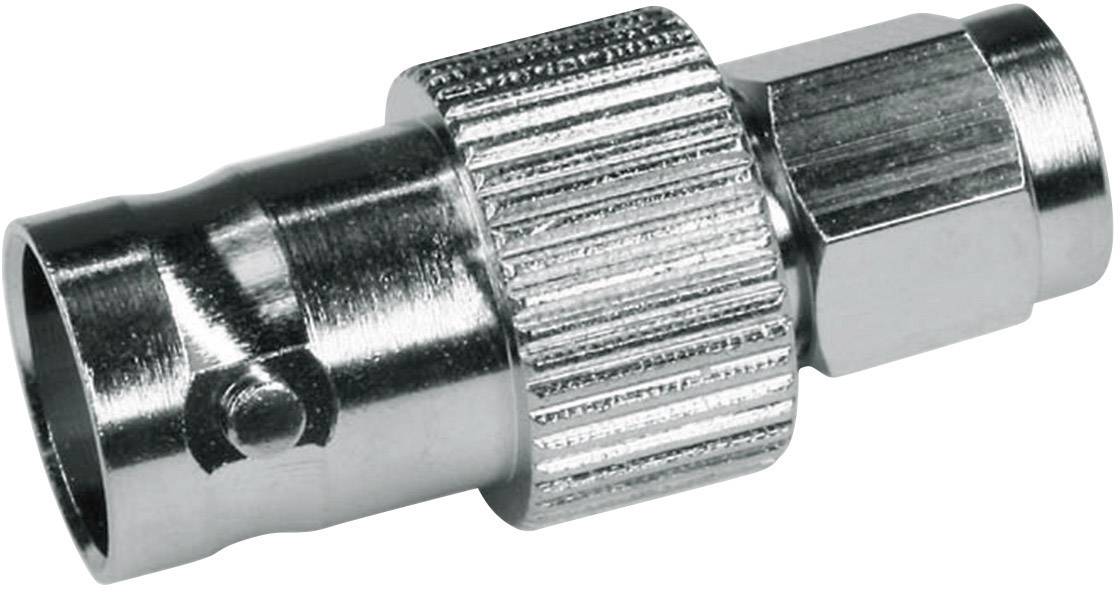 Adaptateur coaxial métallique à poignée striée, adapté pour connecter des câbles d'antenne dans des appareils audio ou vidéo.