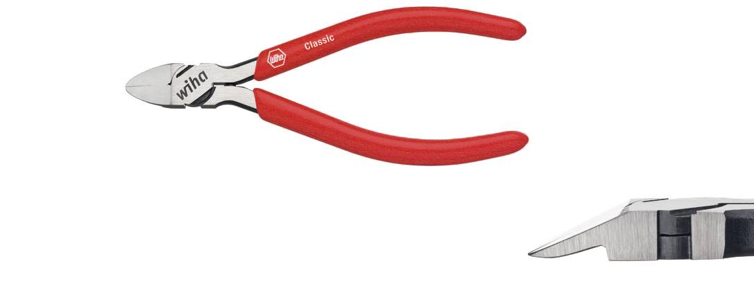 Pince coupante Wiha Classic avec poignées rouges, adaptée pour couper du fil ou des câbles. Gros plan sur les lames de coupe précises.