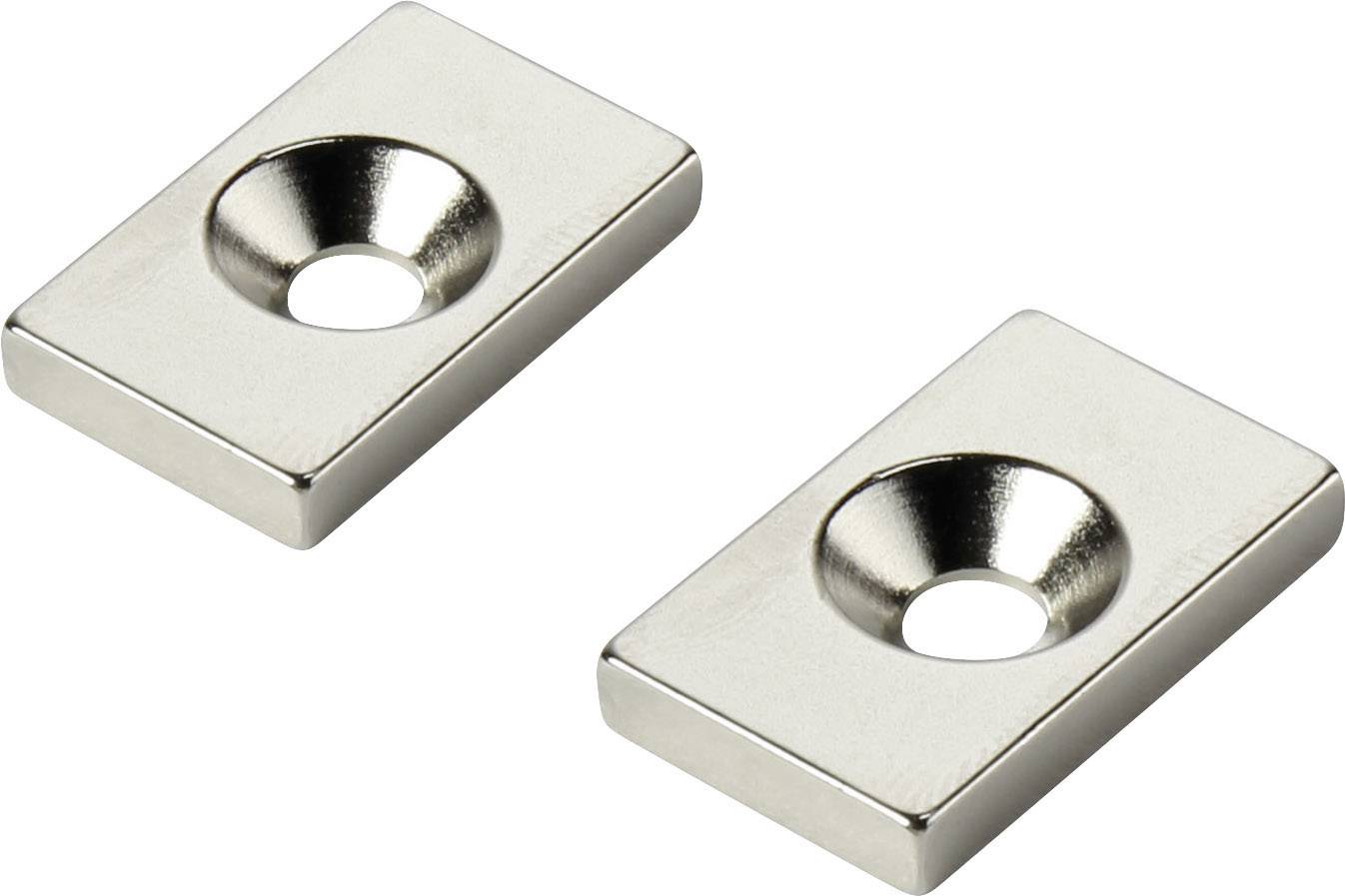 Deux plaques métalliques rectangulaires en argent, avec un trou central formant une dépression.