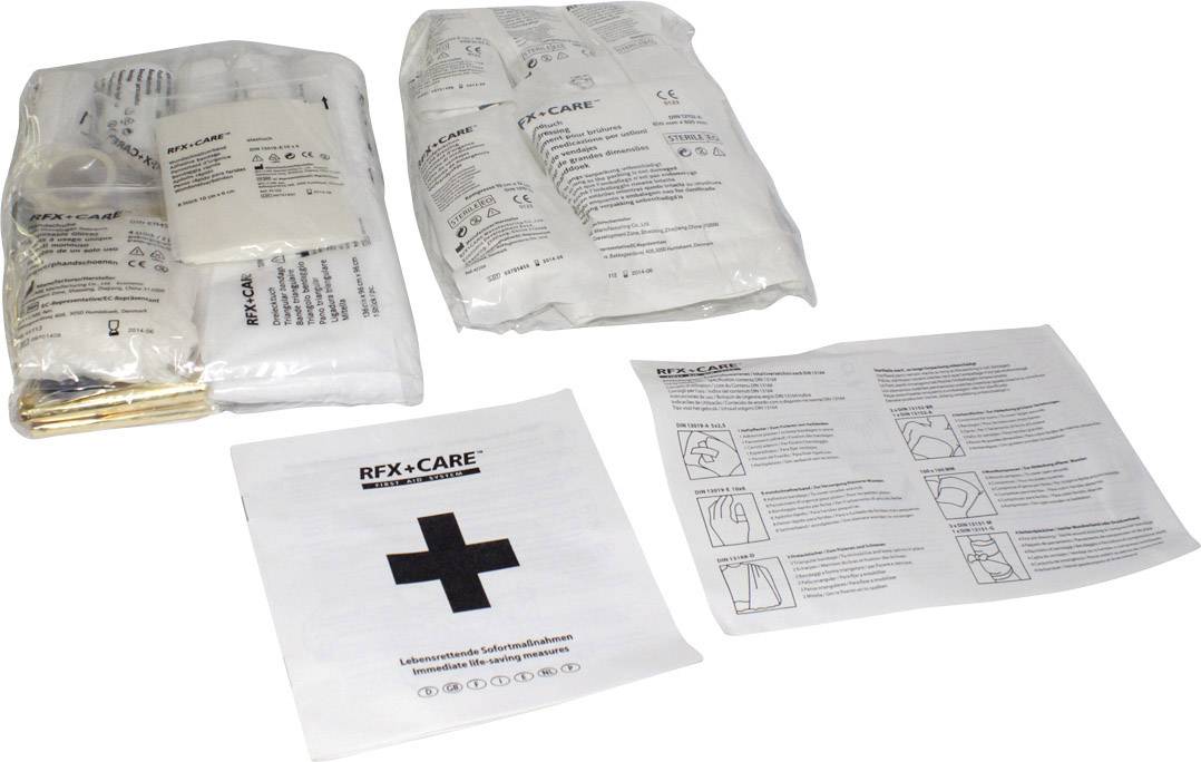 Kit de premiers secours comprenant du matériel de pansement, des pansements adhésifs et un mode d'emploi sur une feuille de papier.