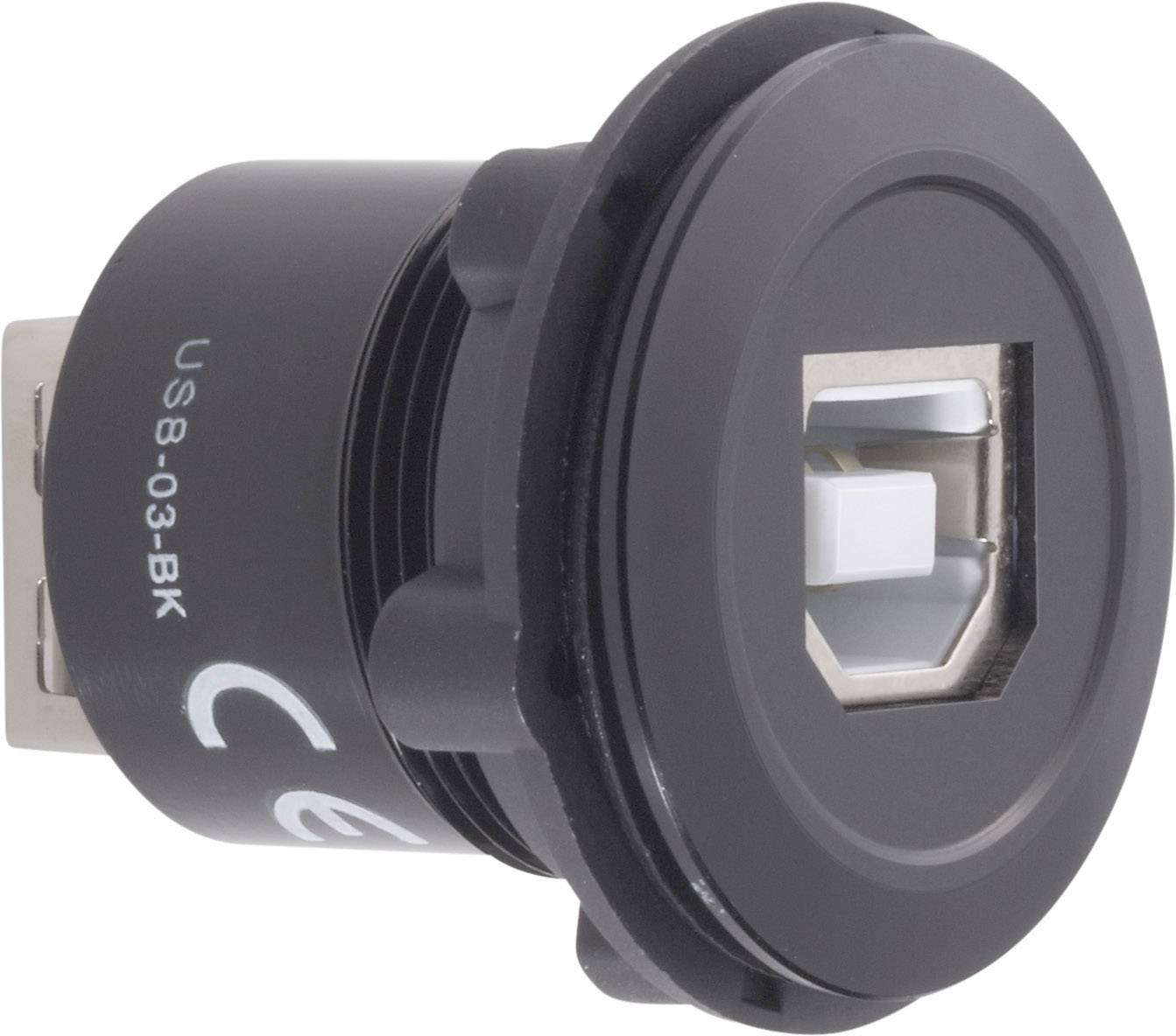 Module de connexion USB noir rond avec marquages CE, vue frontale d'une prise.