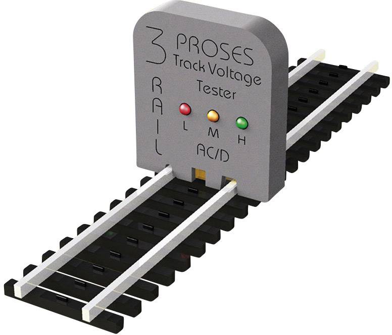 Testeur de tension pour voies de train miniature avec LED pour tensions basses, moyennes et élevées. Se trouve sur un tronçon de voie.