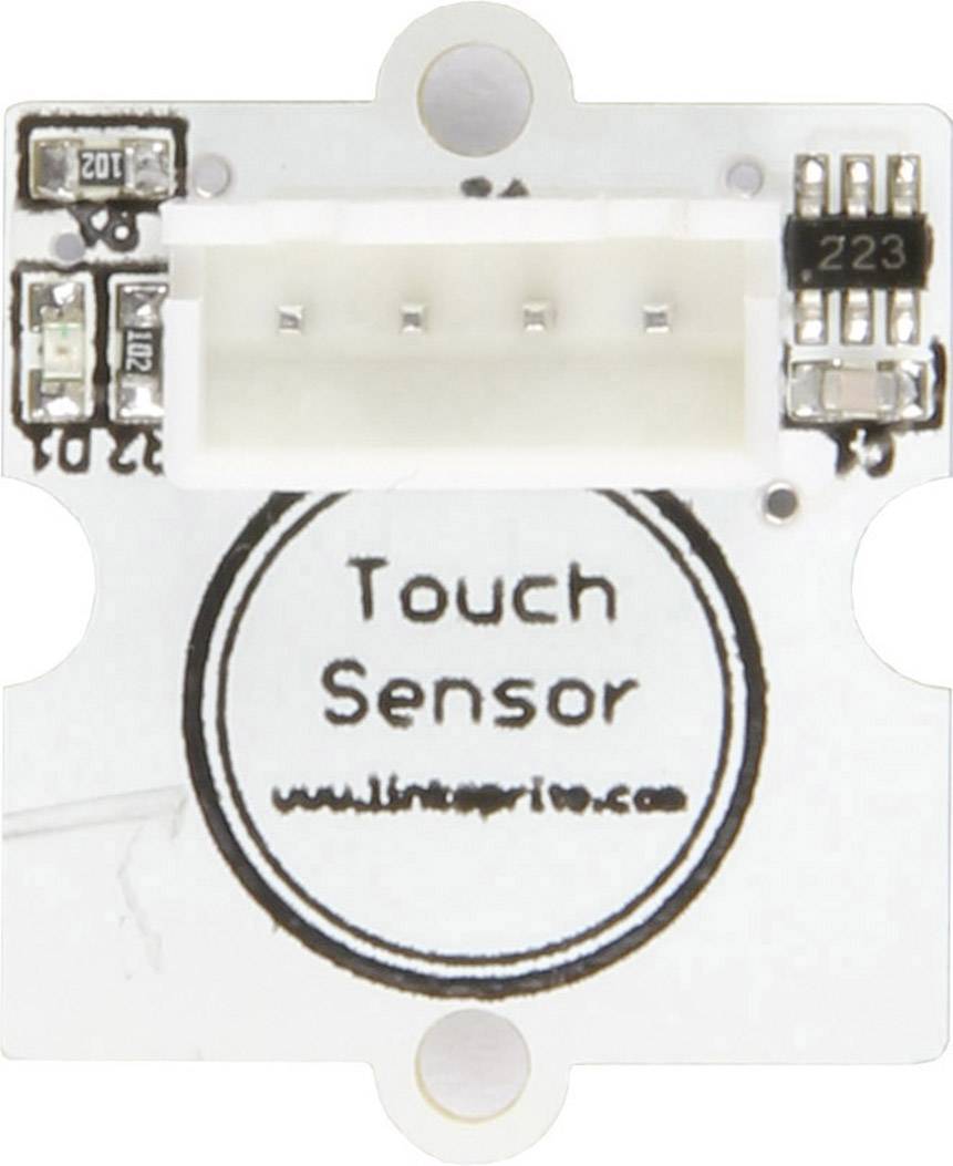 Un capteur tactile blanc avec un bord noir, portant l'inscription 'Touch Sensor', avec un connecteur au centre, entouré de circuits électroniques.