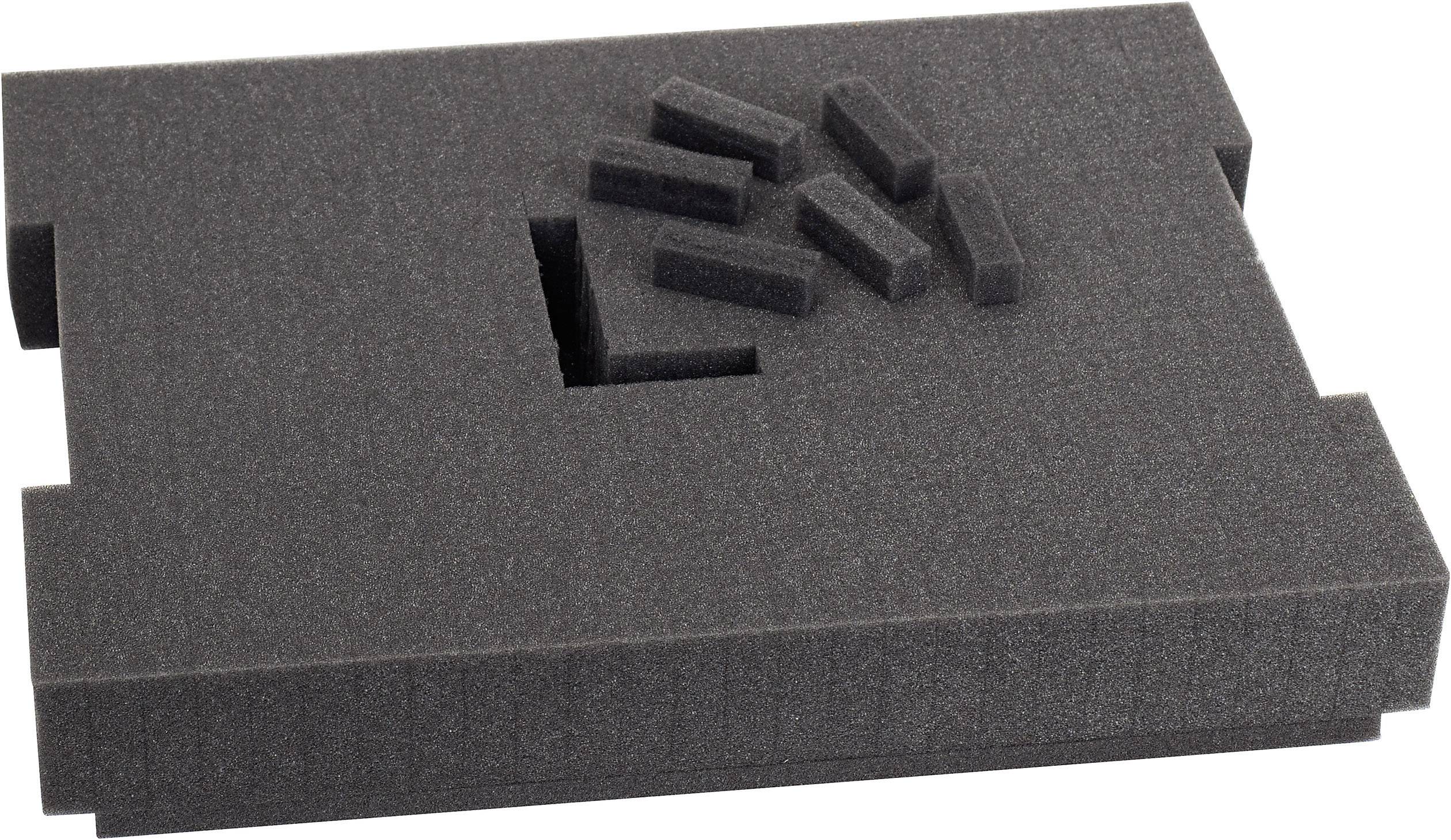 Bloc en mousse gris foncé avec des insertions rectangulaires amovibles, conçu pour le rangement sécurisé ou l'emballage d'objets.