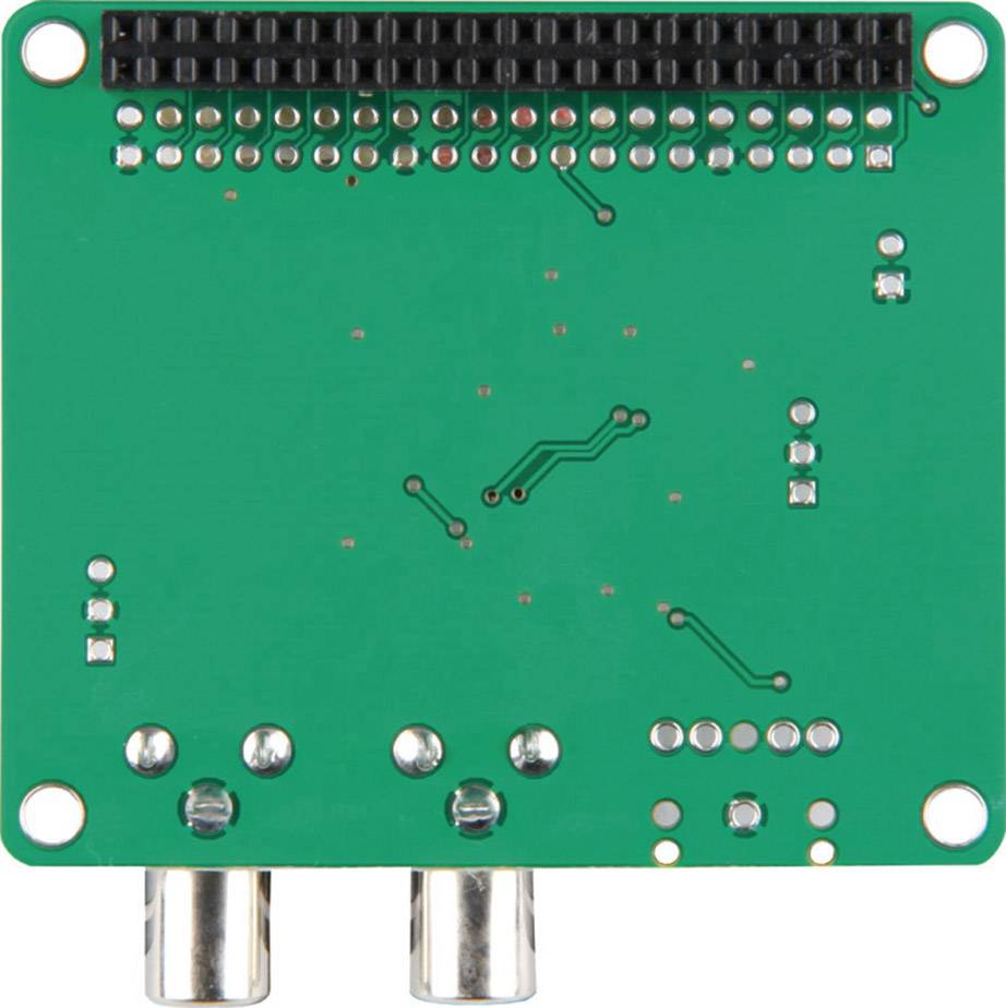 Circuit électronique vert avec différents points de soudure et composants. Deux connexions métalliques sur la face inférieure.