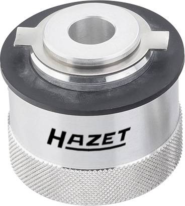 Outil métallique portant l'inscription 'Hazet', de forme cylindrique, avec base striée, probablement un embout ou un adaptateur spécial.