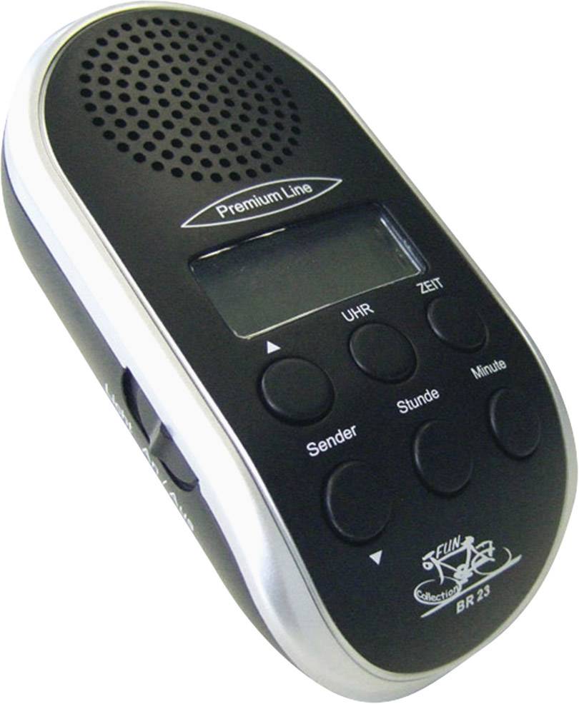 Un radio portable noir avec une grille de haut-parleur sur le dessus, un affichage numérique, des touches pour les stations, l'horloge, l'heure et les minutes.
