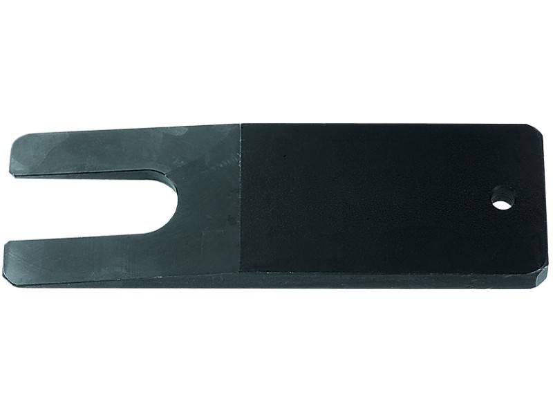 Un coin noir avec une fourche à une extrémité et un trou de l'autre côté. Souvent utilisé comme outil de montage.