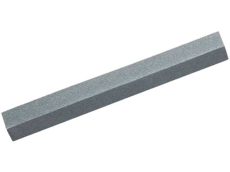 Une meule grise en matériau abrasif, de forme rectangulaire, sur un fond blanc. Principalement utilisée pour les travaux de meulage.