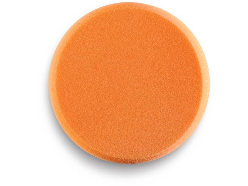 Une éponge ronde de couleur orange.