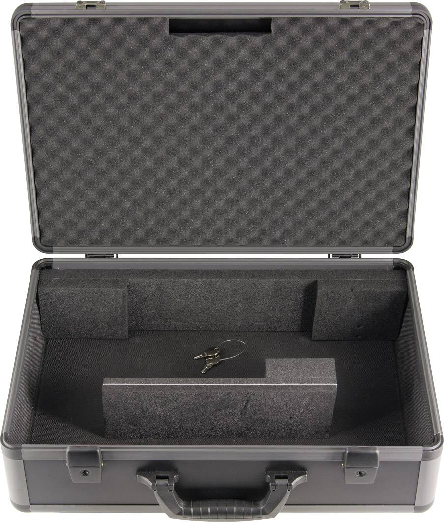 Une valise noire ouverte et vide avec un intérieur en mousse ; un trousseau de clés est posé à l'intérieur. La valise est équipée d'une poignée de transport.