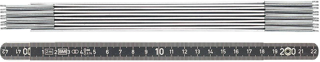 Des barres de métal argentées sont placées parallèlement, avec une règle noire en centimètres allant de 1 à 22 au-dessus, tous deux alignés horizontalement.