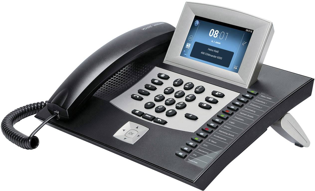 Un téléphone de bureau moderne avec un grand écran et de nombreuses touches de fonction. L'écran affiche l'heure 08:01.