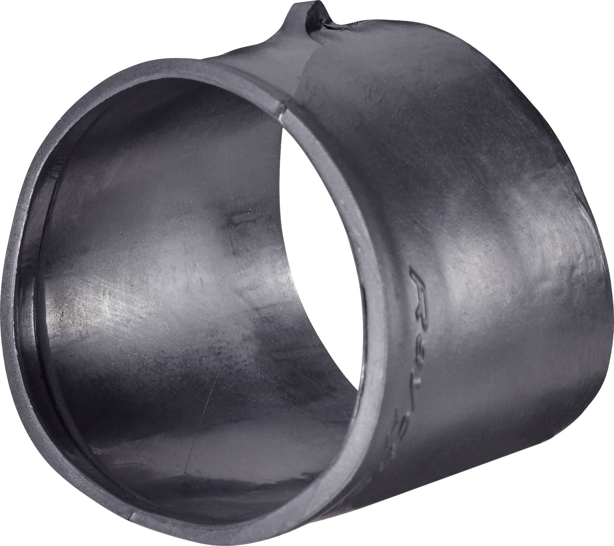 Un anneau noir en plastique à côté ouvert. L'anneau a une surface lisse et est légèrement ovale. Aucun autre détail n'est visible.