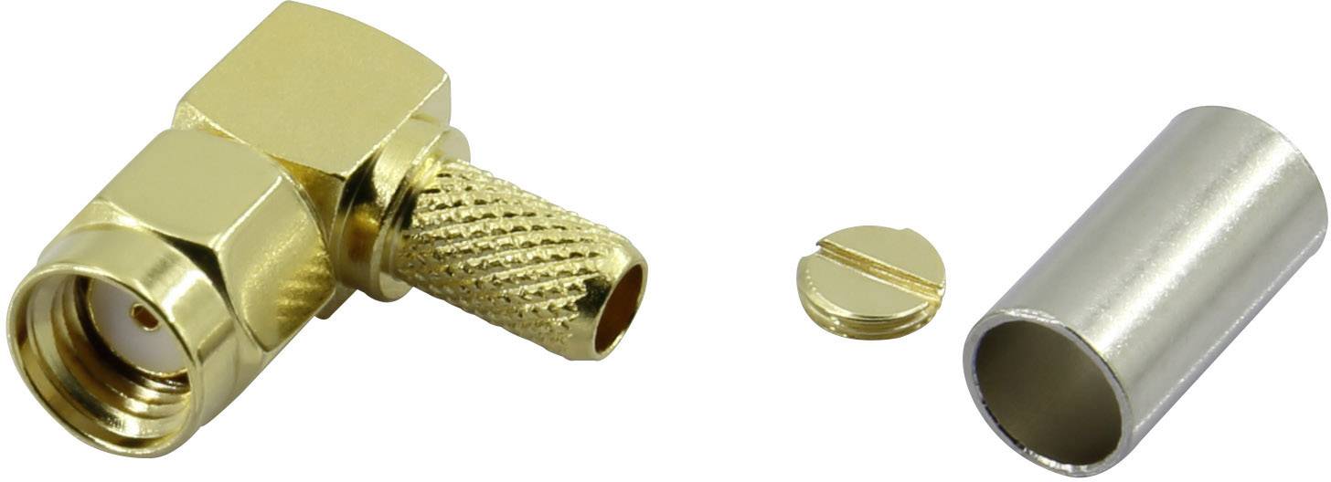 Une fiche d'angle en métal avec une connexion dorée et un morceau de métal cylindrique à côté, probablement pour des connexions de câbles.