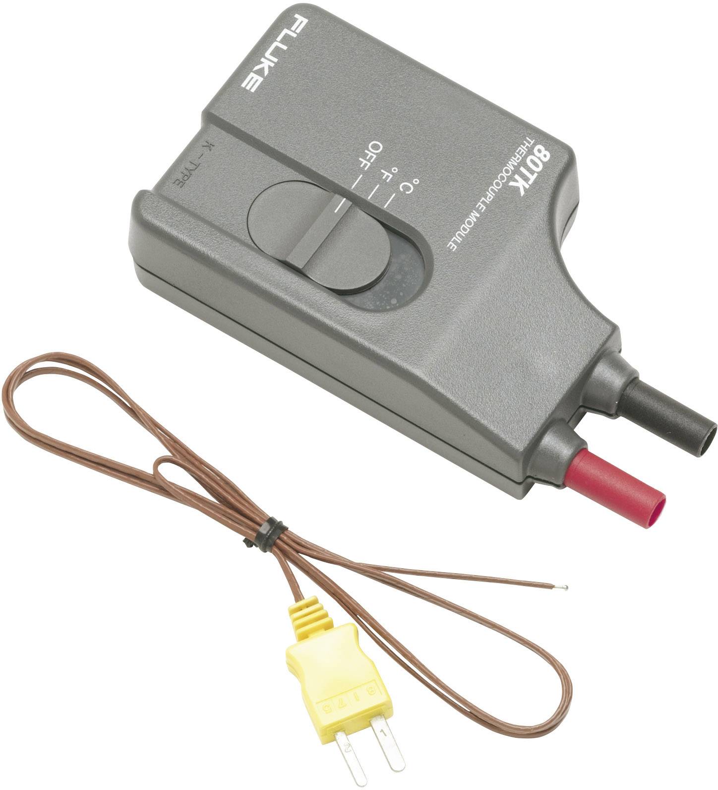 Le module thermocouple Fluke 80TK présente un module adaptateur avec un commutateur rotatif et une prise de thermocouple pour la mesure de température.