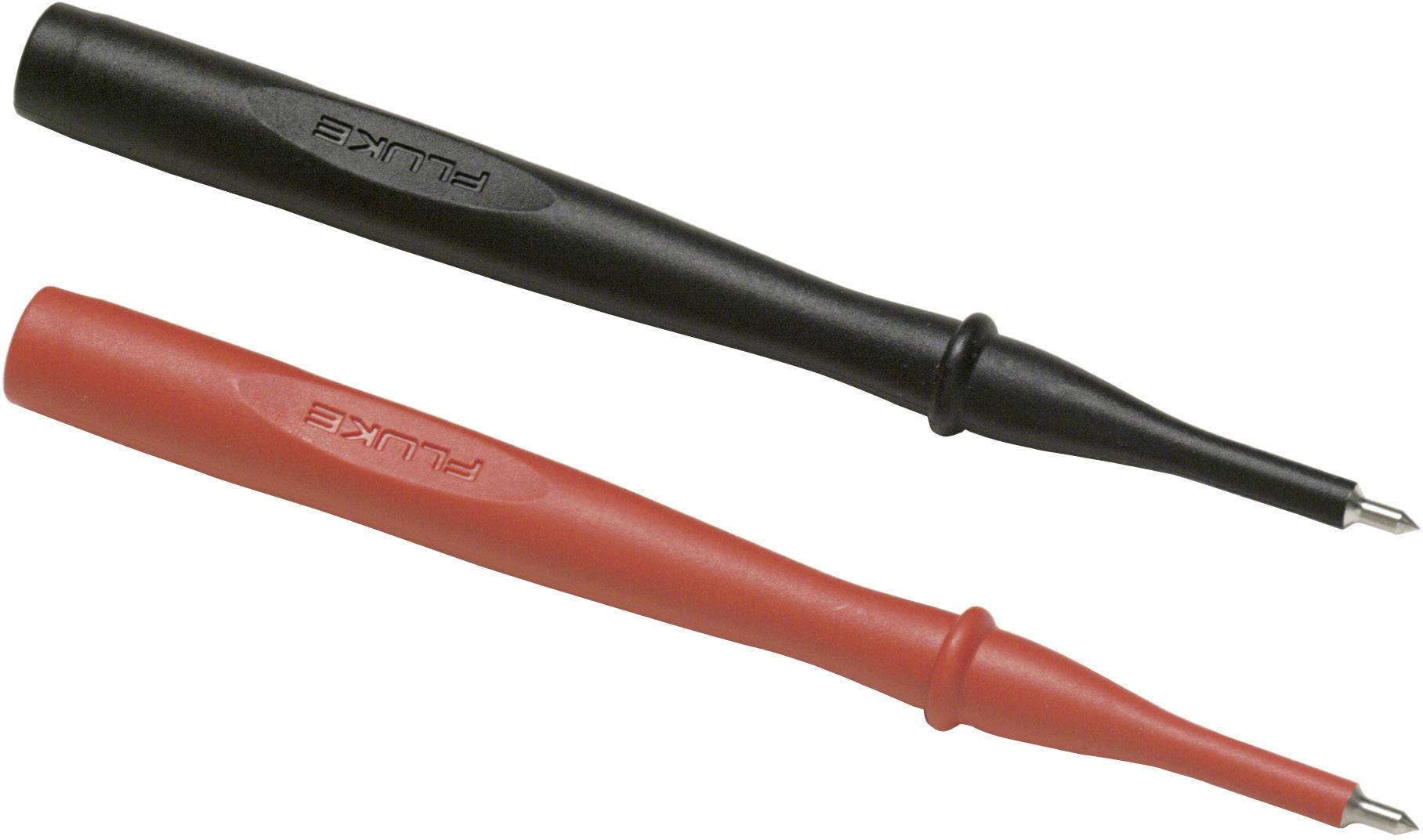 Deux stylos testeurs, un noir et un autre rouge, portant l'inscription 'Fluke'. Utilisés pour les mesures électriques.