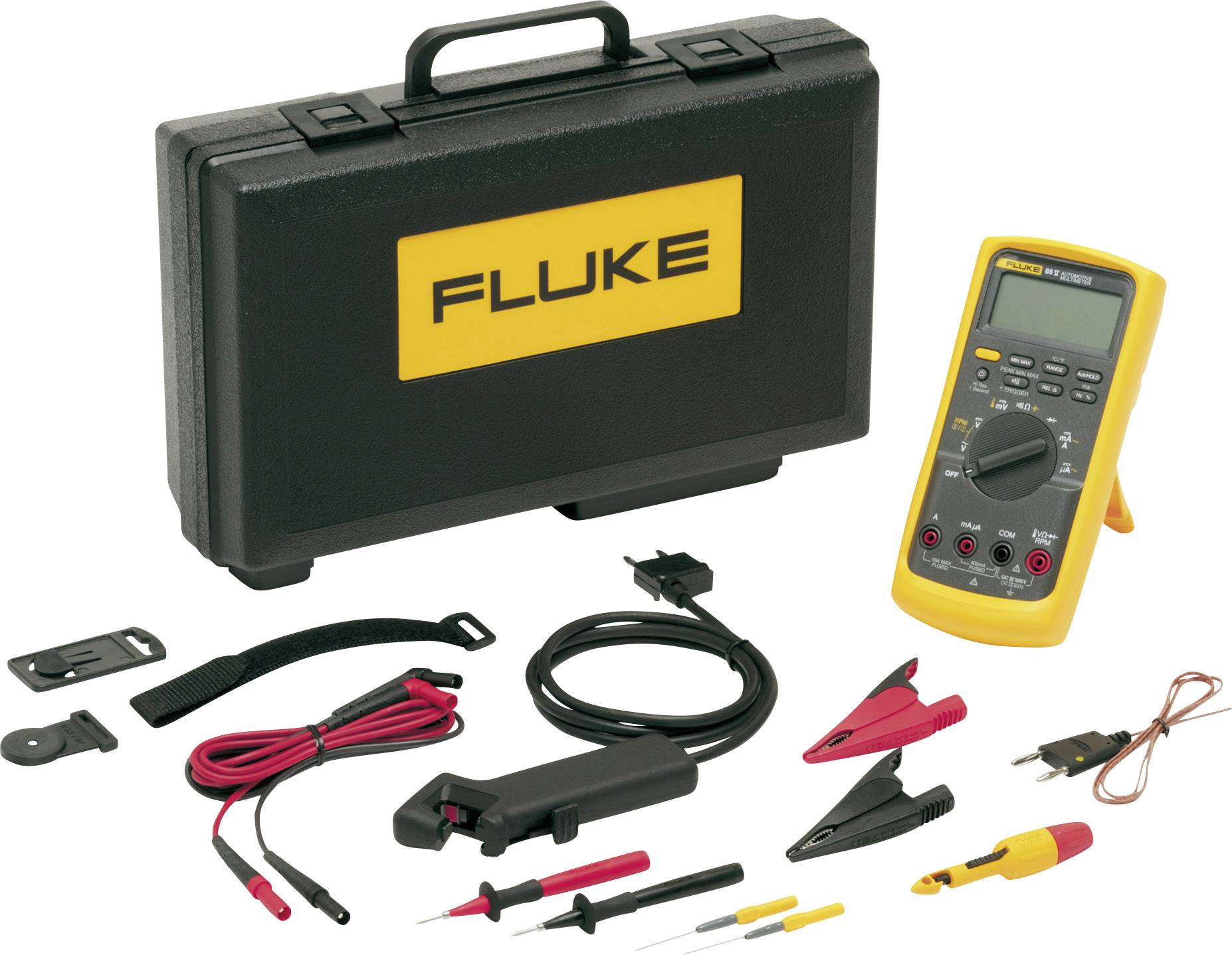 Kit de mesure 'Fluke' avec mallette de transport, multimètre et accessoires tels que câbles et pinces. Idéal pour les mesures électriques.