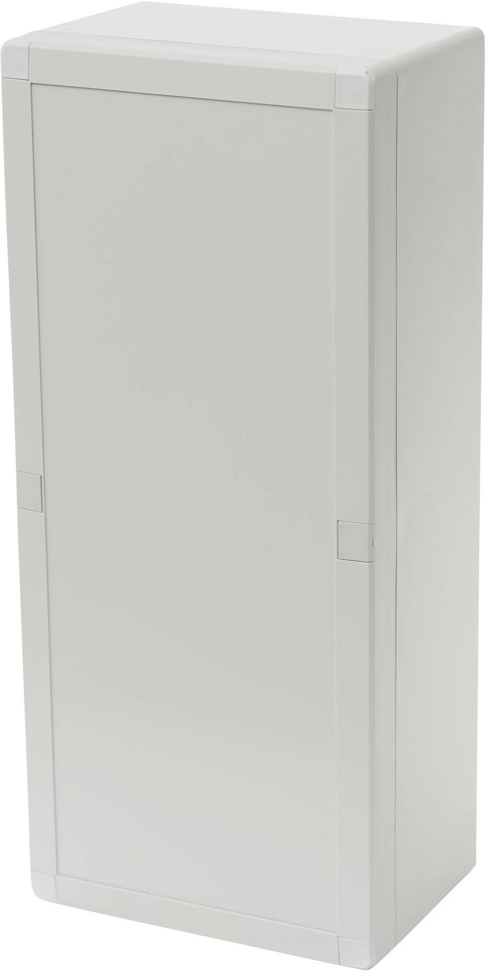 Boîtier de commande gris, vertical, avec deux charnières latérales et une façade lisse sans poignées ni étiquettes visibles.