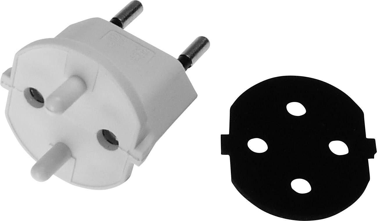 Un adaptateur européen blanc à côté d'un couvercle noir, rond, percé de quatre trous pour fiches.