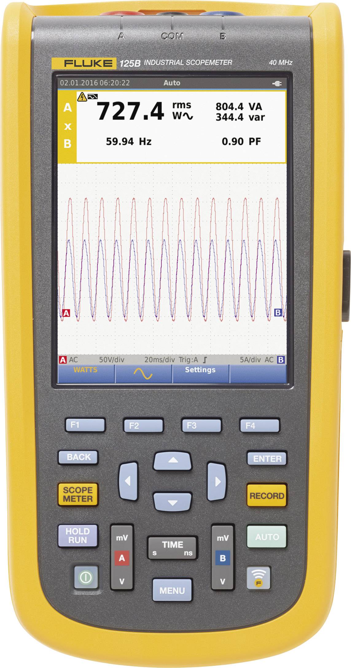 Appareil de mesure portable affichant une mesure de tension : 727,4 V à 59,94 Hz. Écran montrant une forme d'onde sinusoïdale. Nom de la marque en haut.
