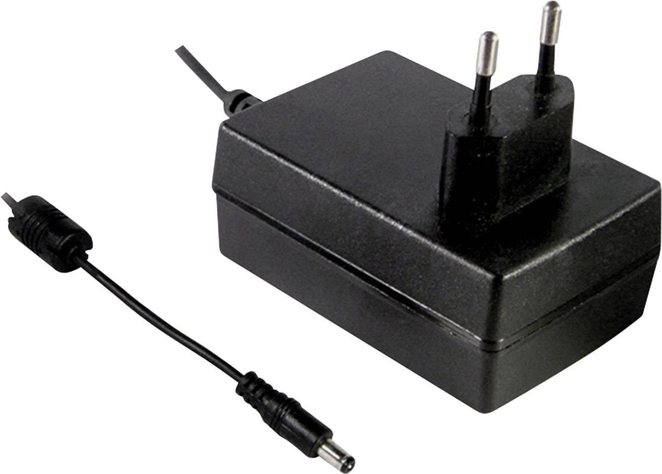 Adaptateur secteur noir avec deux fiches et un câble qui peut être branché dans différents appareils électroniques.